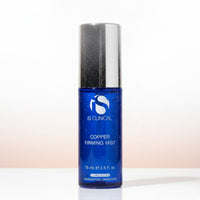 a 75mL blue bottle of the best anti ageing facial spray at home - hydrating iS Clinical Copper Firming Mist available in Sydney skin care online shop
