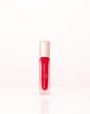Applying Monika Heiligmann Lips In Love Trio for hydrated, plump, Parisian-inspired lips – available at Amirova