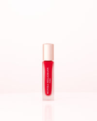 Applying Monika Heiligmann Lips In Love Trio for hydrated, plump, Parisian-inspired lips – available at Amirova
