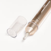 Applying Monika Heiligmann Lips In Love Trio for hydrated, plump, Parisian-inspired lips – available at Amirova